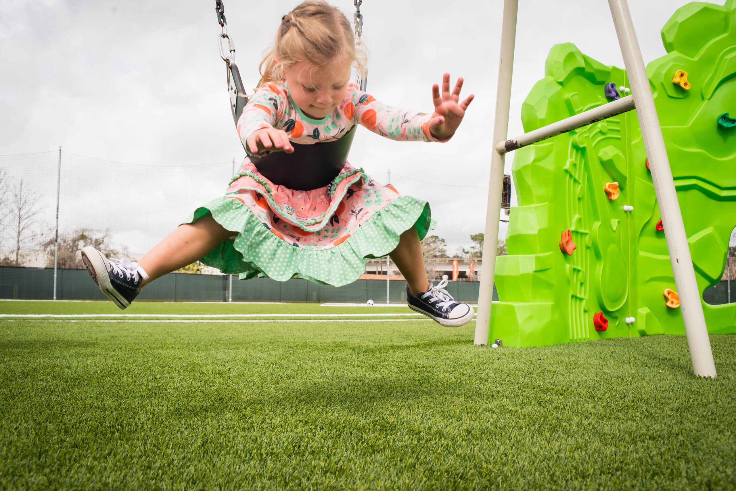 Grass365 offers synthetic grass for playgrounds.