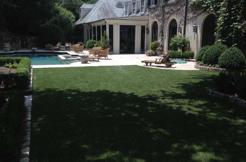 Artificial Grass Backyard next to pool