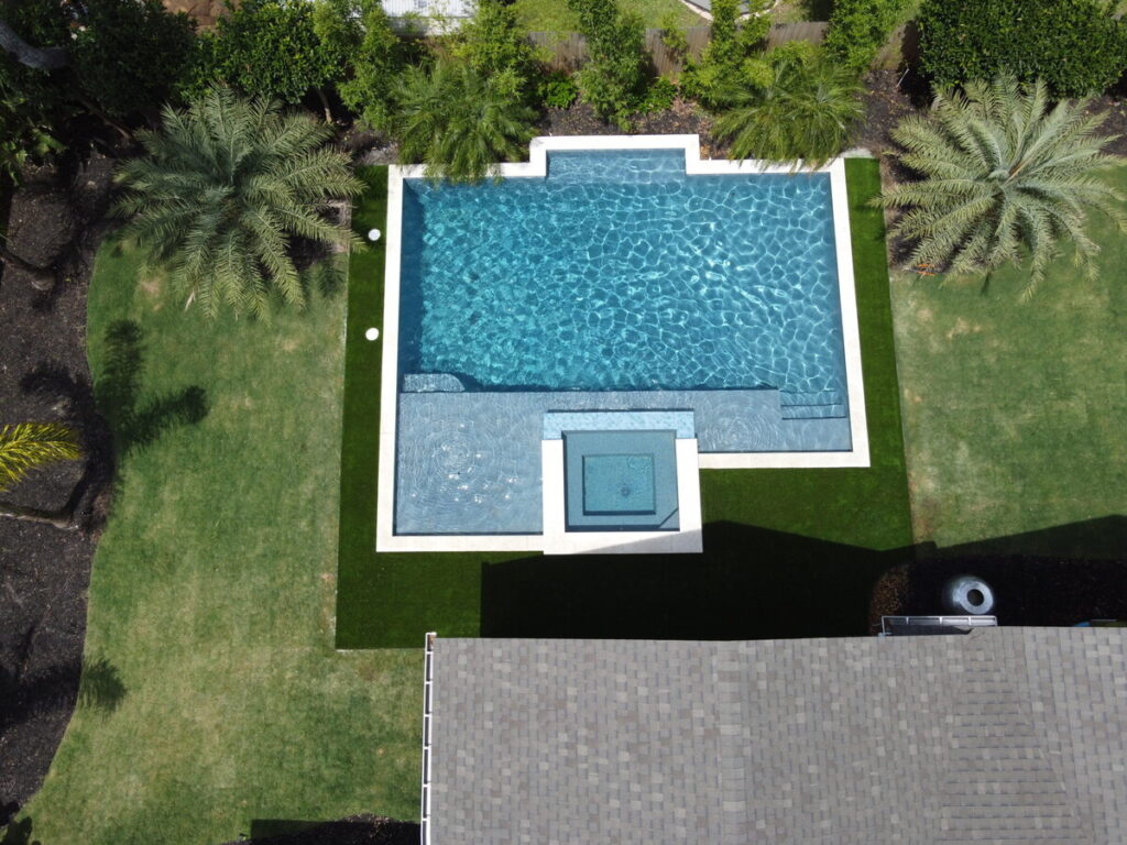 Drone view of jacksonville artifiical turf around pool